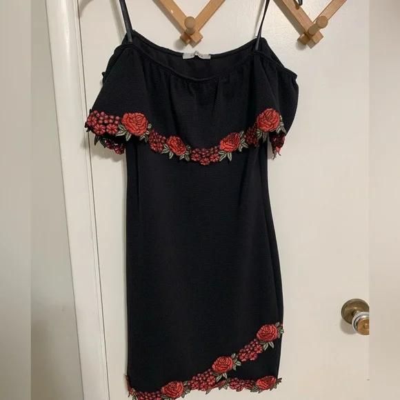 Black dress with red roses